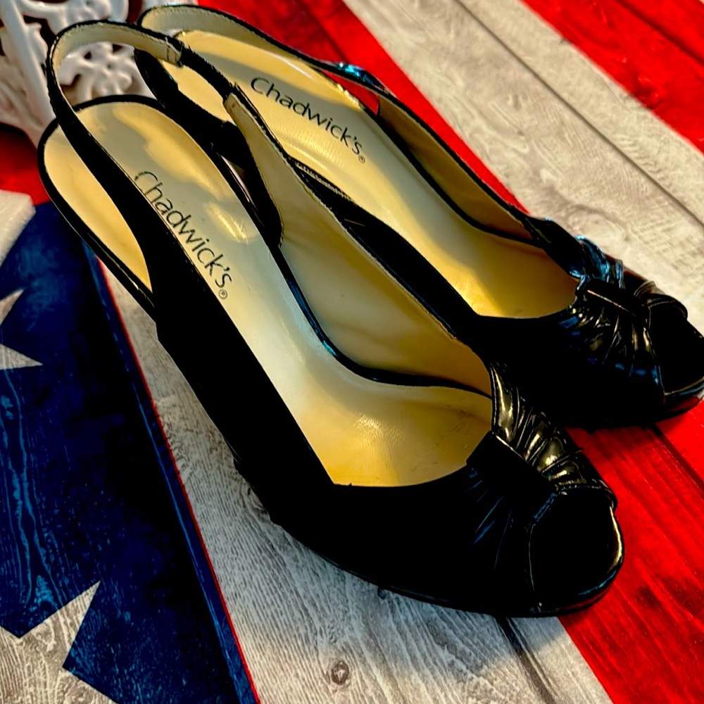 Chadwick’s Black Patent Leather sling back pumps